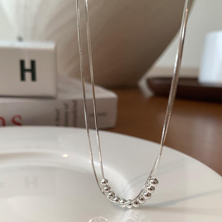 Doppellagige Metallhalskette mit runden Perlen für Damen - Modisches & vielseitiges Schlüsselbeinketten-Design