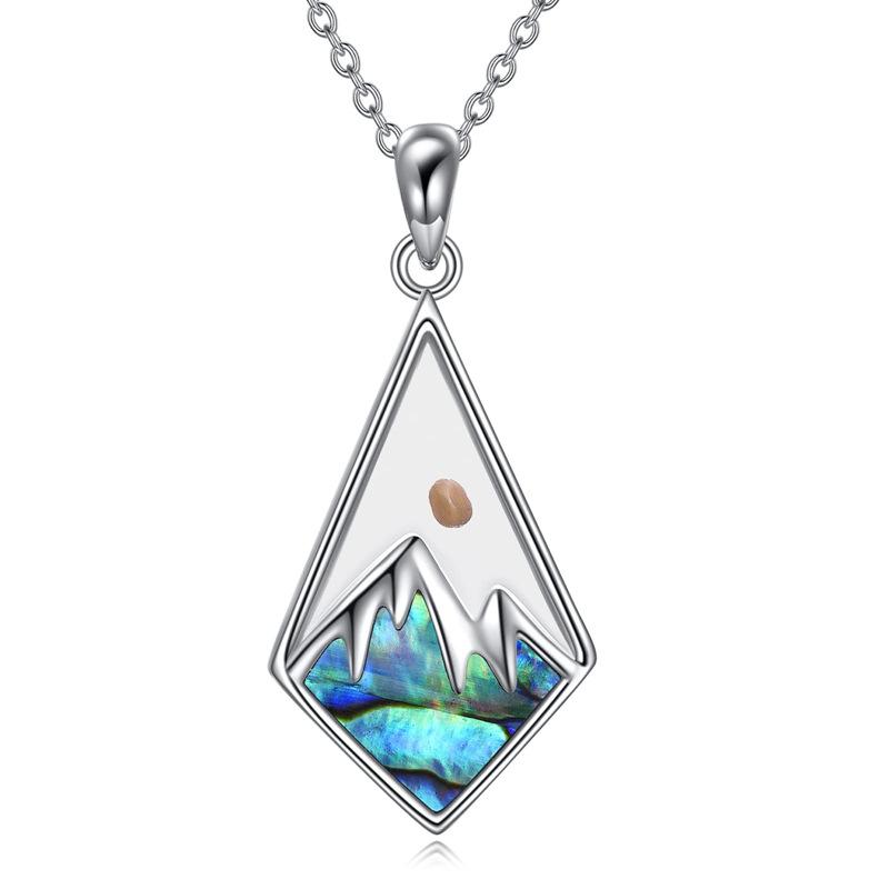 

Fashionally Simple, with A Geometric Shape, Hill-like Design, Mustard Seed Seeds, Stainless Steel Necklace and Earrings. Silver necklace