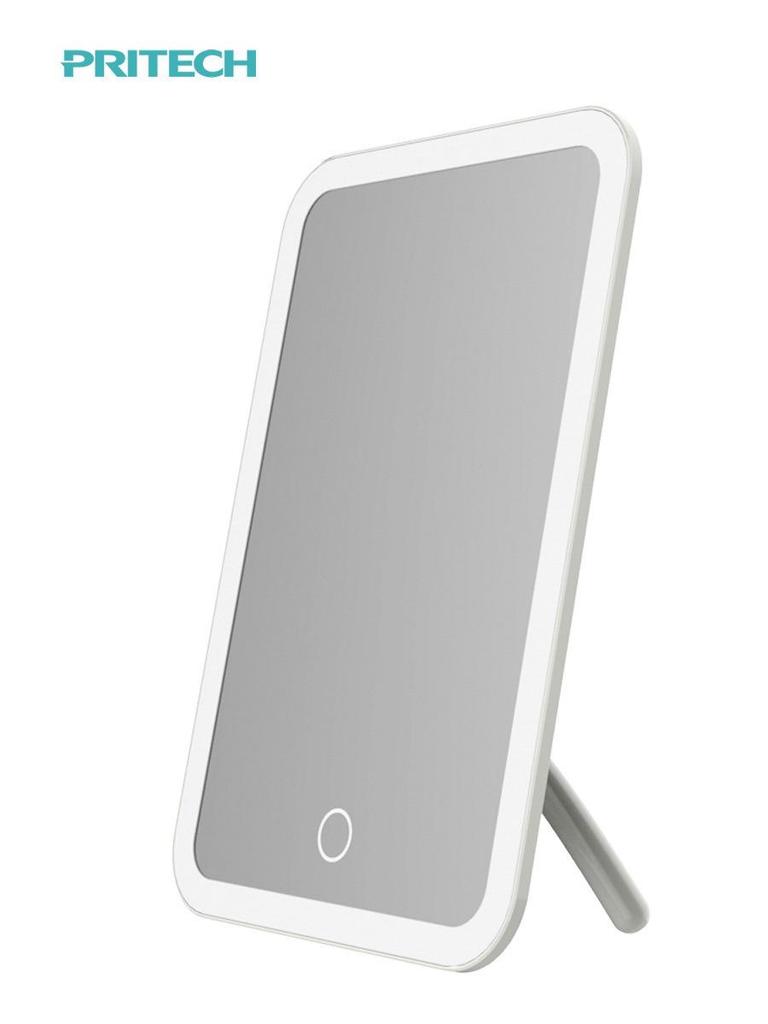 Peach LED Makeup Mirror with Intelligent Touch Dimming, HD Lighting, and Rechargeable Function.