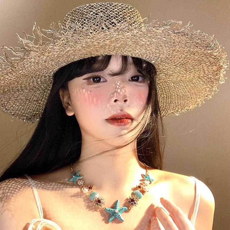 Salzgras Muschel Ethnischer Hut Sommer Strandurlaub Strohhut Atmungsaktiv Sonnenschutz Hohler Strohhut mit breiter Krempe
