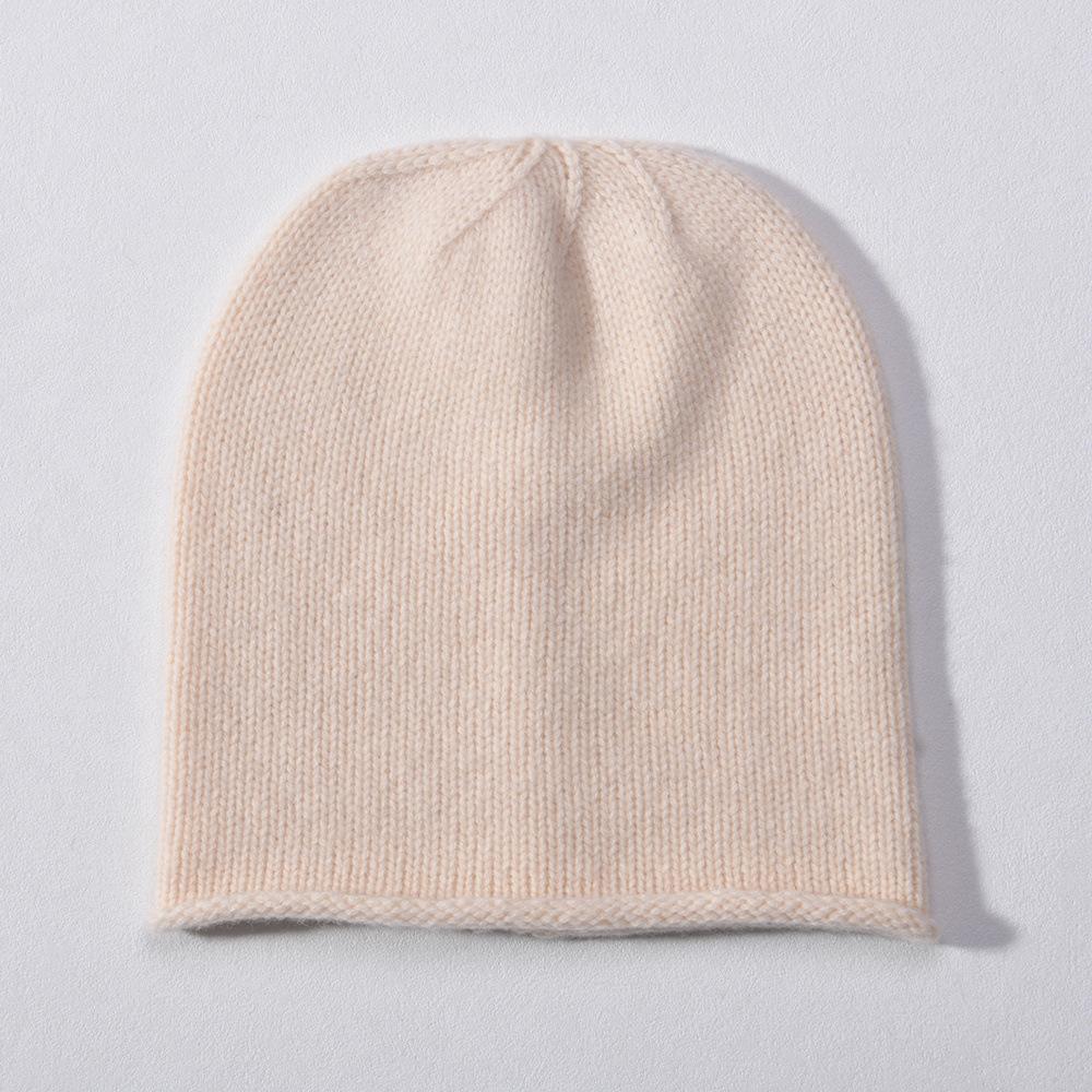 Autumn and winter new% all-wool small crimping cold hat warm ear protection wool hat solid color knitted hat