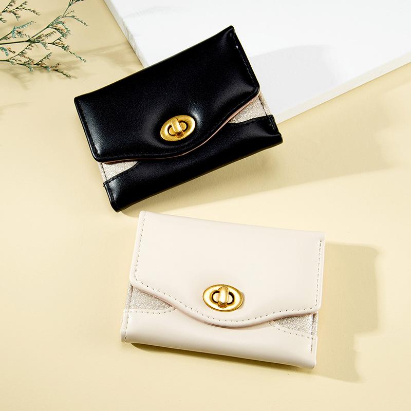 Women's short wallet, cute large capacity, multi-card position, simple ins student lock 30% off change bag tide