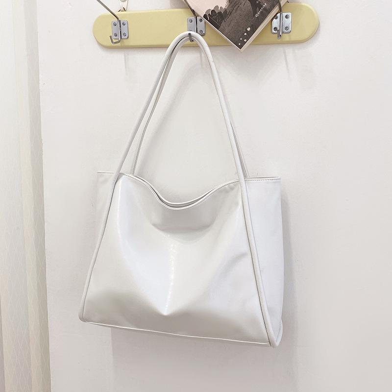 New Soft Leather Large Capacity Tote Bag with Niche Design For Handheld Use Women Commuting Shoulder Underarm Bag