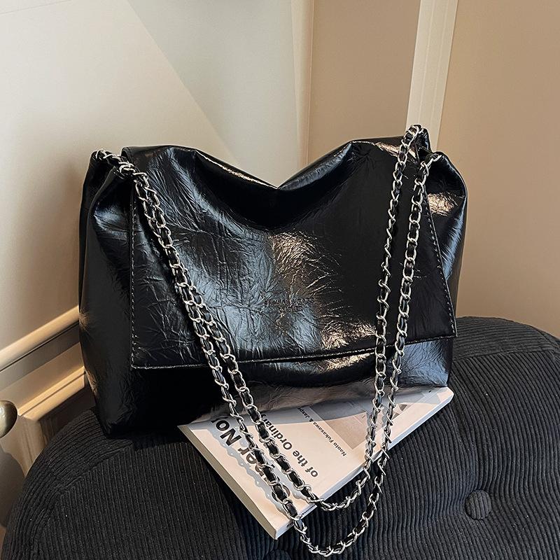 

Повседневная вместительная сумка для поездок на работу, женская новая популярная универсальная сумка через плечо на цепочке 2025 года, премиальная сумка-тоут чёрный