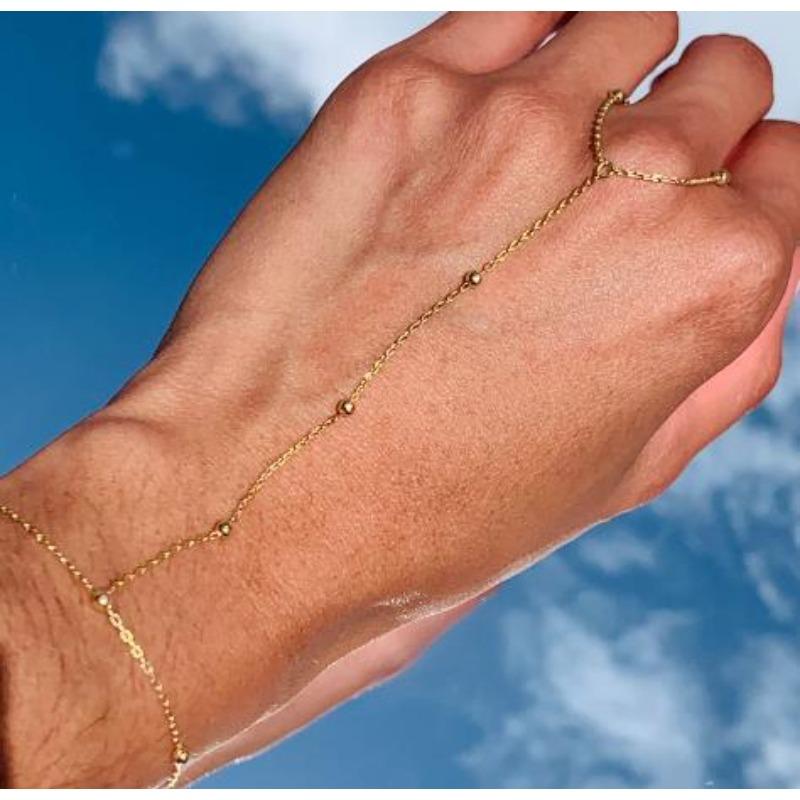 Zirconite Linked Finger Bracelet for Women. Simple and Fashionable Jewelry Set with Golden Beads. Golden C