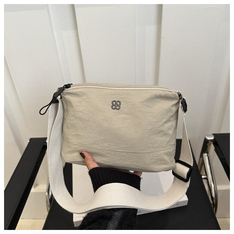 

Stylish and simple solid color waterproof women s shoulder bag nylon messenger bag casual versatile small bag wholesale one piece delivery хаки