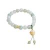 Women's Tianshan Gold Silk Jade Bracelet with White Floating Flower Design