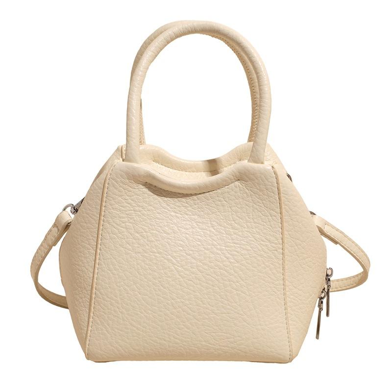 Wholesale fashion high sense simple style solid color lychee pattern bucket bag casual versatile commuter messenger women's bag