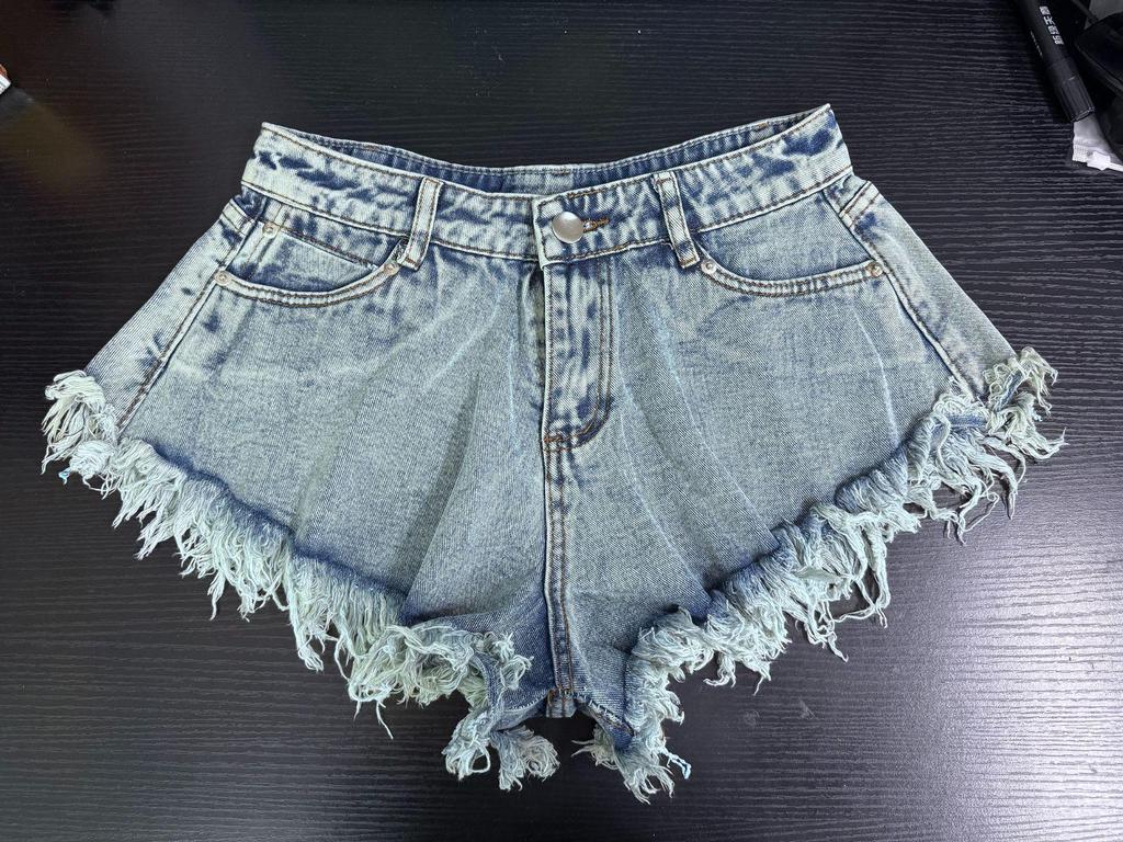 Shorts en jean déchirés taille haute à franges pour femmes style européen et américain 2024