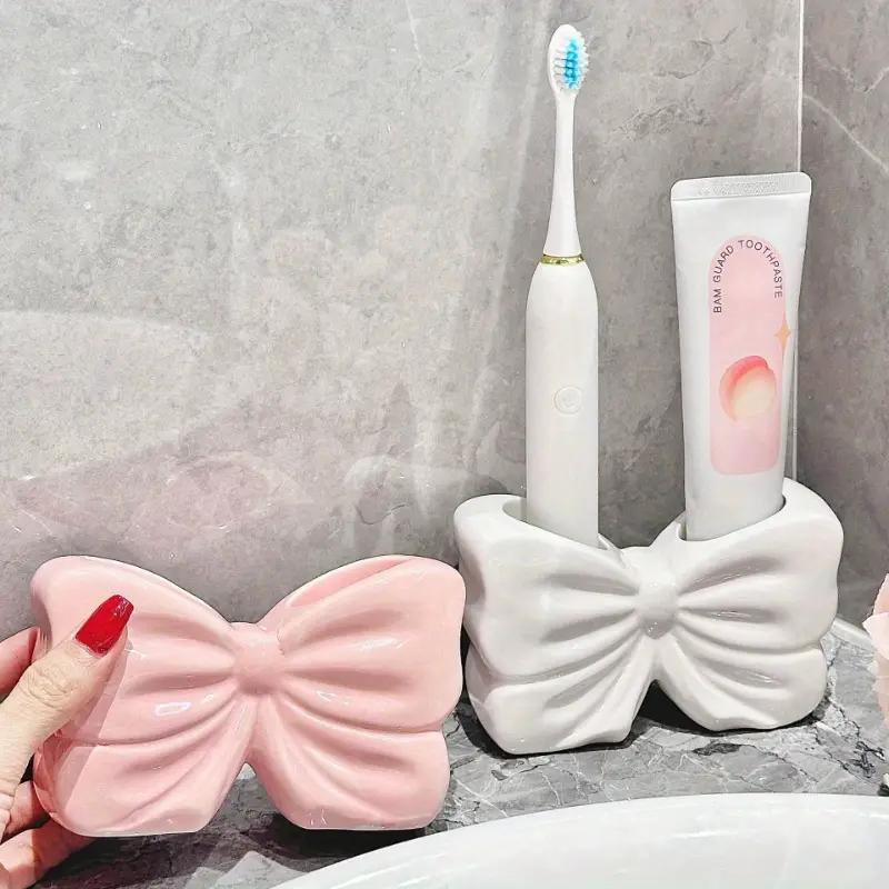 1pc Ceramic Bow Toothbrush Holder Ornament Ceramic Toothbrush Toothpaste Storage Rack Bathroom Accessories Brush Holder