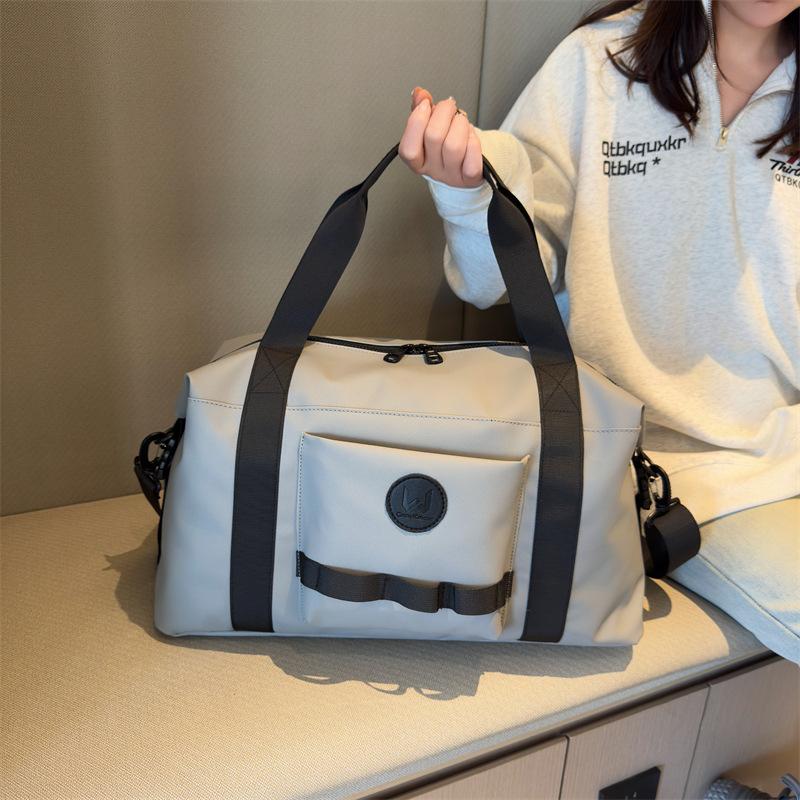 Short-distance portable travel bag, women's light and large-capacity business travel luggage bag, new Korean version of yoga sports fitness bag