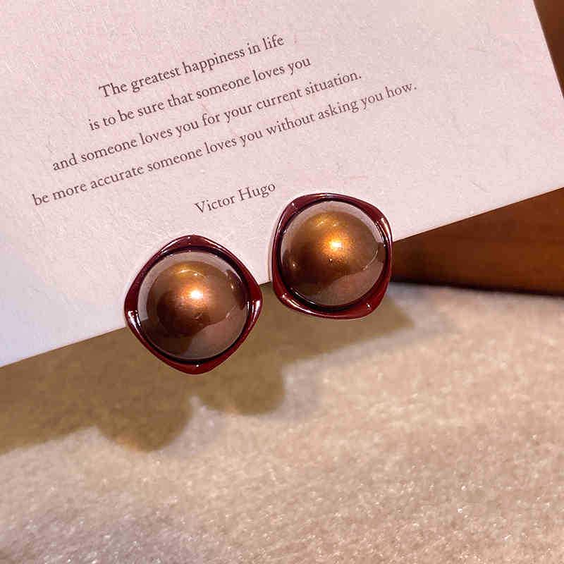 

Геометричні сережки-серця з полуницею та червоною емаллю: Елегантні ретро прикраси Срібна Голка