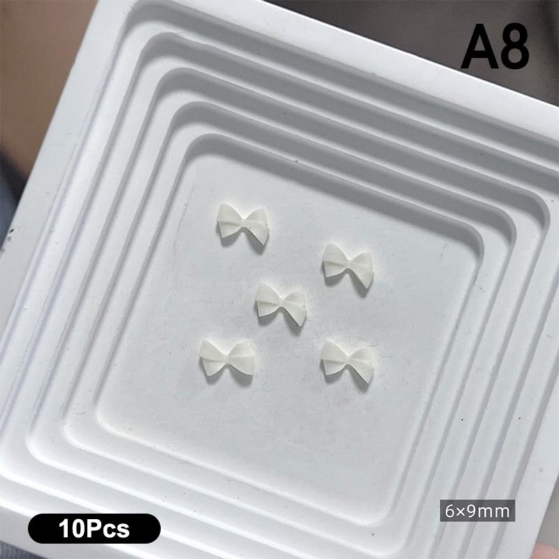 10 Stück Doppellagige Schleifen-Nagelanhänger 3D Süße Band-Schleifen Nagelkunst Strasssteine Mini Harz-Fliege Maniküre Schmuck DIY Teile