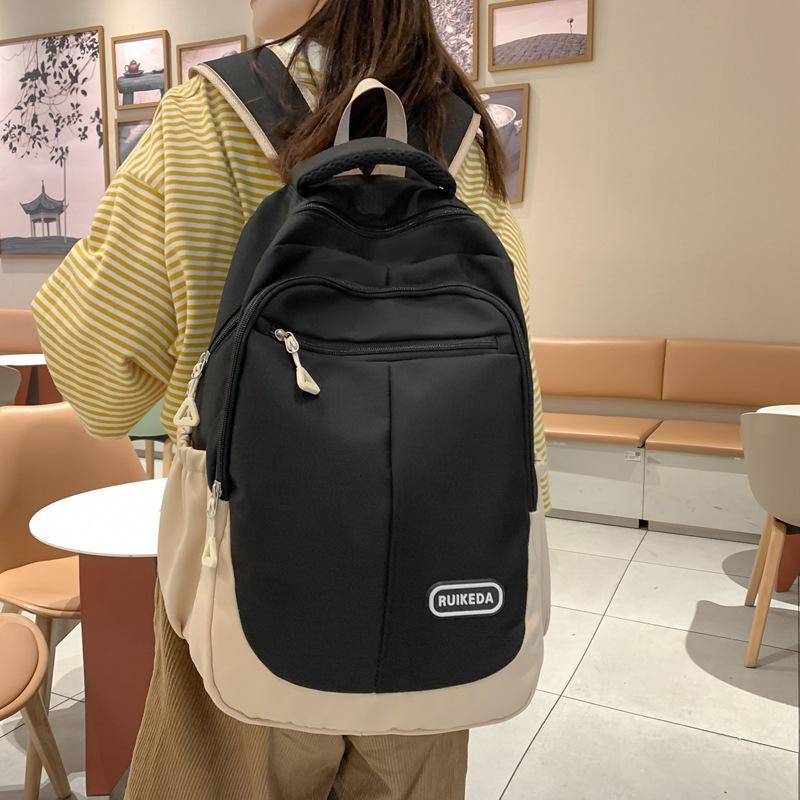 

New backpack contrasting colors, junior high school and high school students schoolbag port large-capacity college student backpack чорний