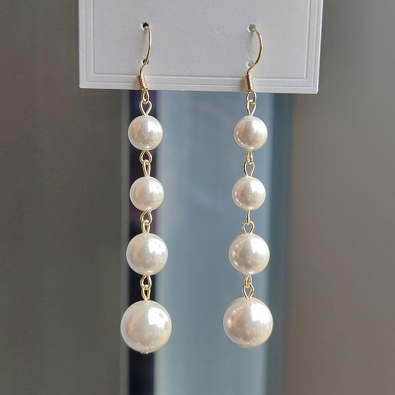 

Стильные и простые высококачественные серьги-бантики, темпераментные универсальные серьги с жемчужной нитью, французские ретро-серьги для женщин