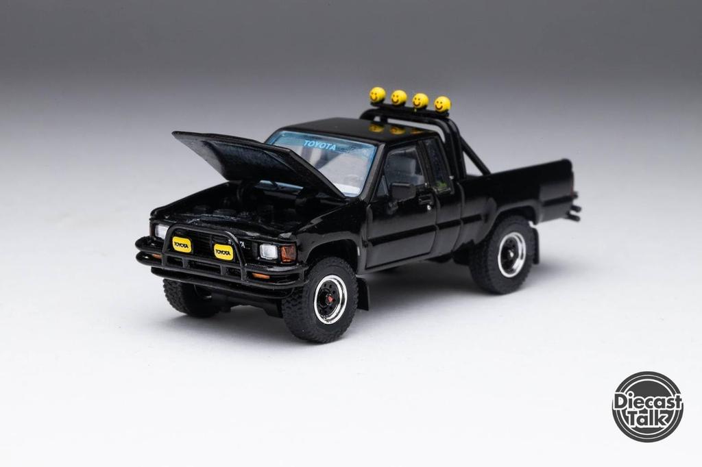 Gaincorp Products Diecasttalk x BoostGear Custom 1/64 Scale Toyota 1985 Hilux 4x4 SR5 Extra Cab Black (Finished)