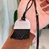 black tassel metal black cord necklace