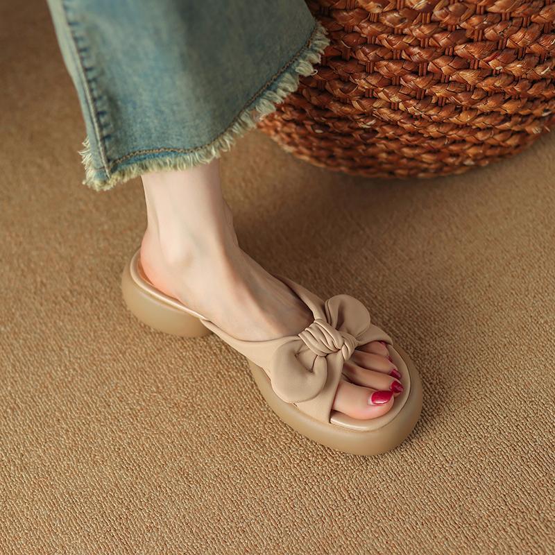 

Non-extravagant Feichi giant cute~ leather round head bow thick bottom open toe one-word drag women wear thick heel sandals 40 абрикосовий