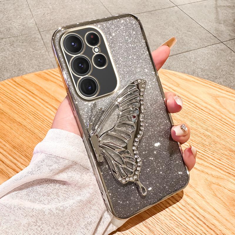 Applicable to Samsung S25ULTRA mobile phone case A05 electroplating glitter NOTE20 diamond-encrusted quicksand butterfly bracket A53 set