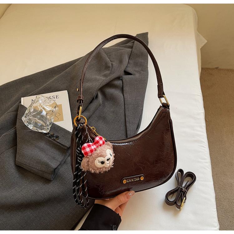 

Premium sense retro small bag women 2025 new autumn and winter versatile single shoulder underarm bag dumpling bag messenger bag темно-коричневого