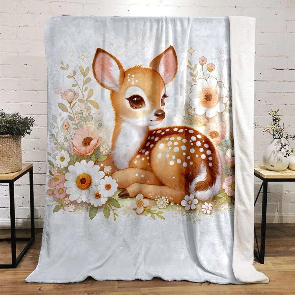 A cute fawn surrounded by delicate flowers and soft pastel foliage. for all seasons blanket lunch break throw gift