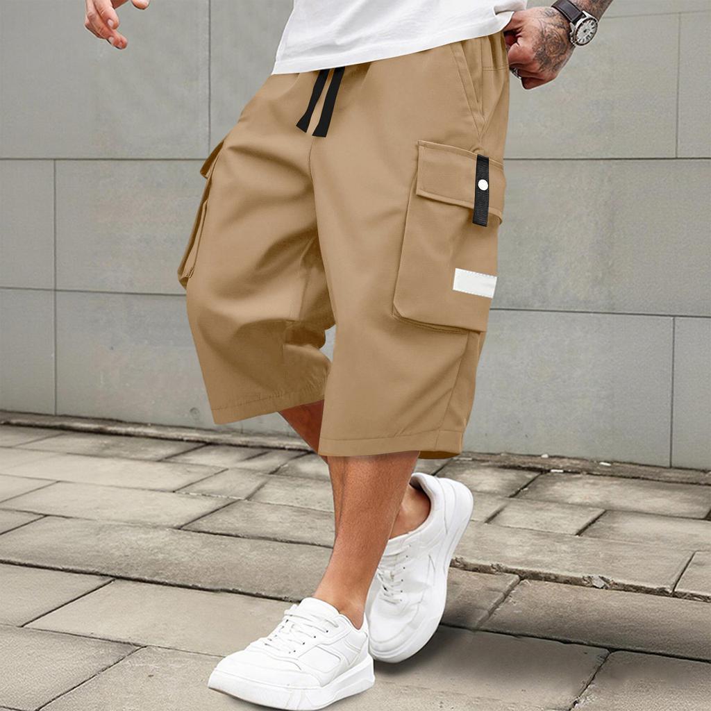 Men's casual and fashionable lace-up lightweight and breathable sports shorts. Men's loose and large-sized multi-pocket workwear shorts.