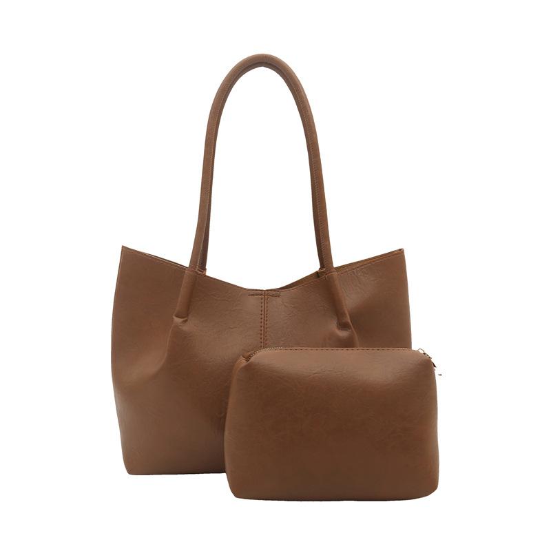 Spring new bag women's fashion soft leather versatile commuter tote bag large capacity shoulder armpit bag