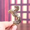 Retro Brass Yuanbao War Horse Tea Pet - Zodiac Money Stepping Horse Ornament for Desktop Home Decor.