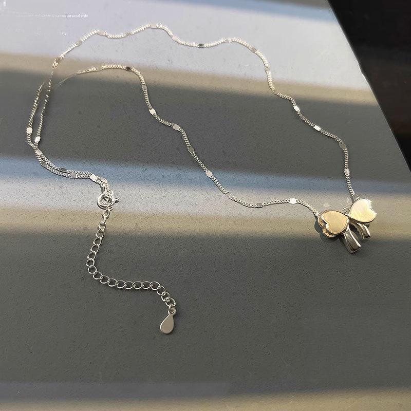 Collier Pendentif Double Face Nœud pour Femme Chaîne Clavicule Tempérament Mode Nœud Coquille Nouveau Style