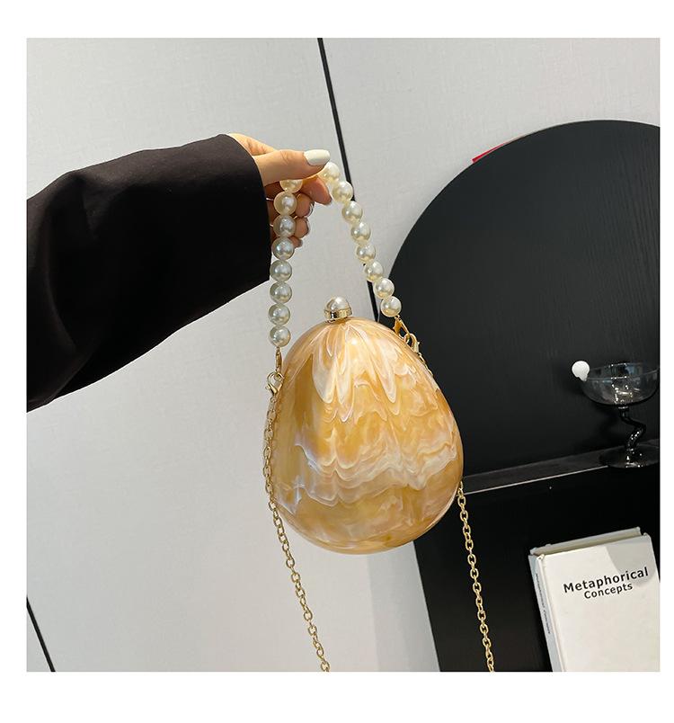 

New acrylic eggshell bag 2025 fashion niche design women s messenger bag portable dinner bag