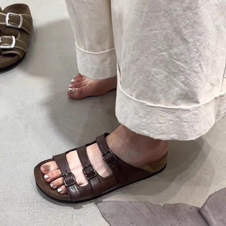 Soft leather version~ Retro belt buckle one-word slippers women's flat bottom versatile lazy people wear black beach shoes with one pedal