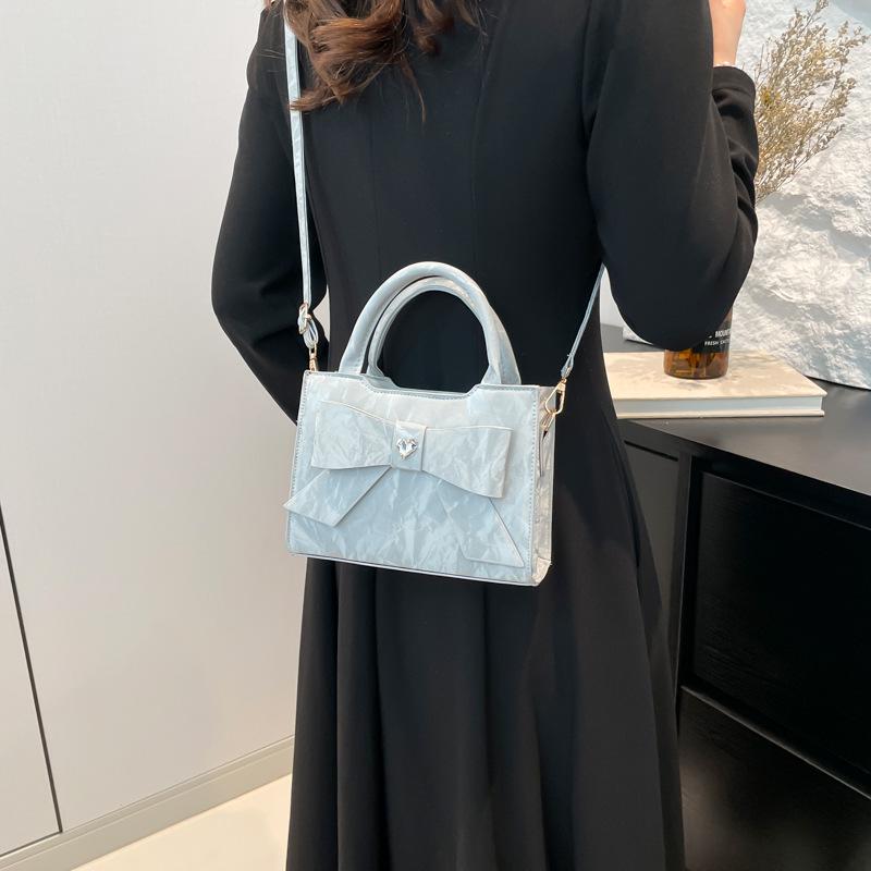 Highend fashion women's handbag bow simple shoulder messenger bag commuter versatile women's bag