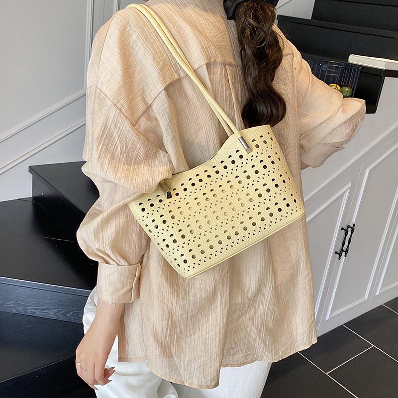 Large-capacity hollow bag women's summer versatile shoulder mother and child bag leisure work commuter tote bag