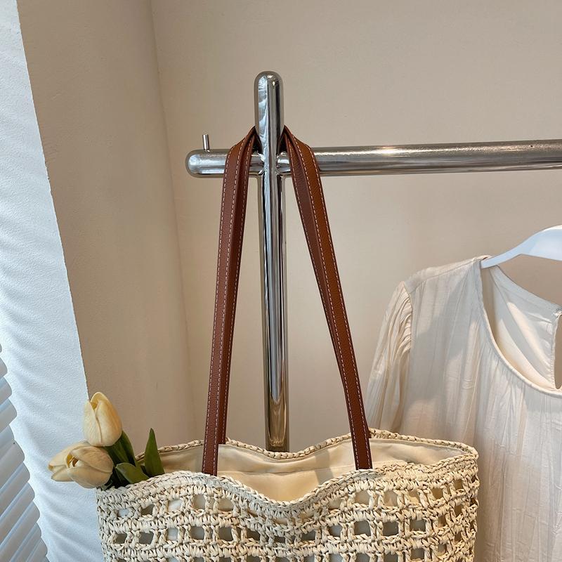 Handwoven Straw Tote Bag with Leather Handles and Open Weave Design Perfect for Summer Beach and Casual Outings