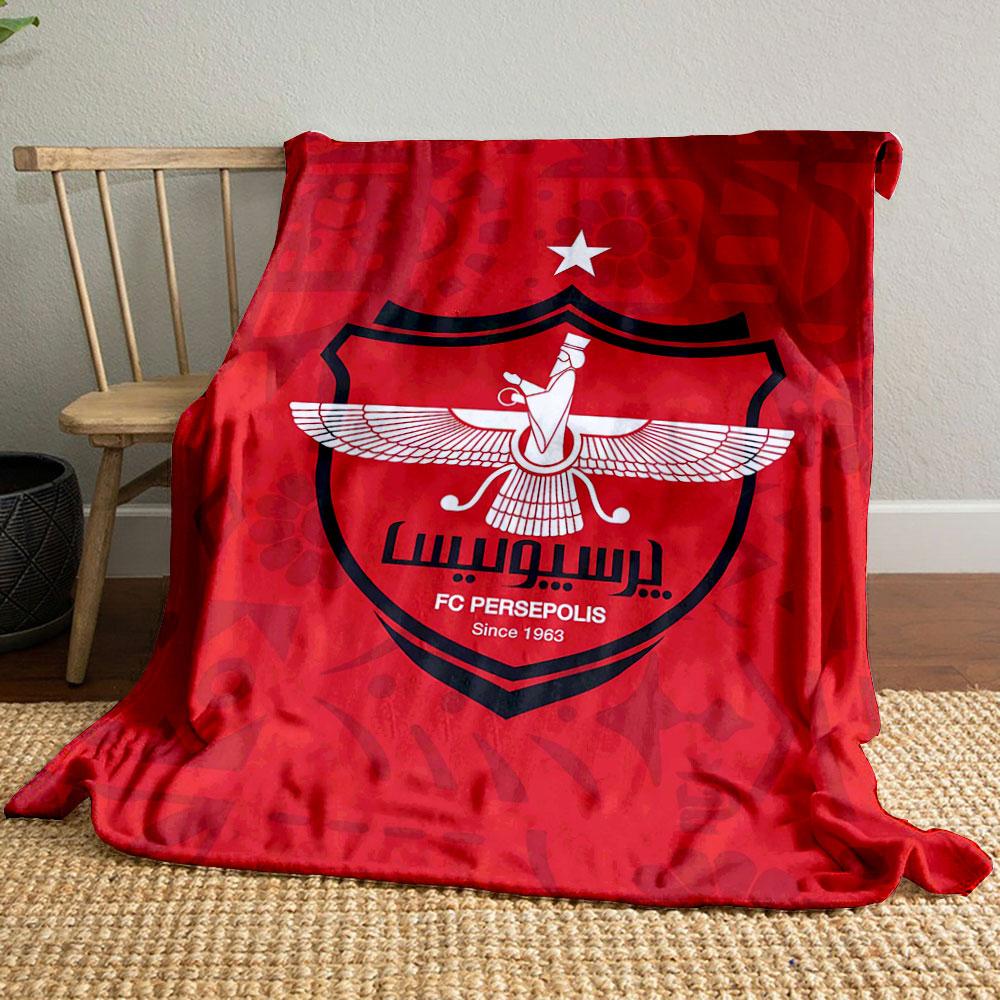 A red background with a central crest, winged figure, and a top white star. for all seasons blanket lunch break throw gift