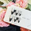 Handmade Black French Polka Dot Gel Nails - Chic Spicy Girl Style Manicure with High-End Sparkle.