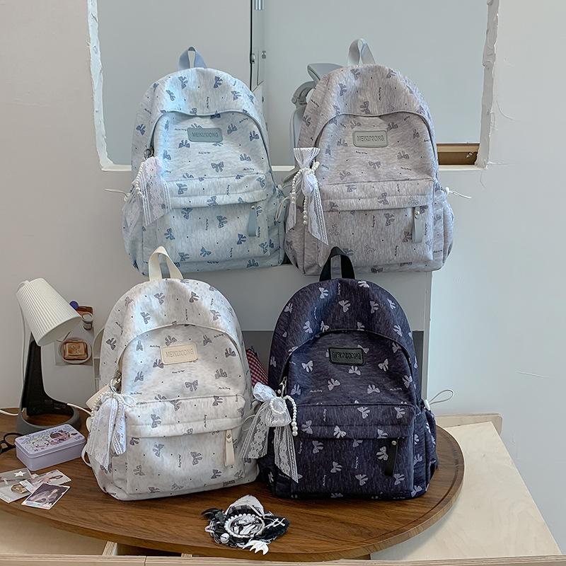 Schulranzen wind neuer Stern Rucksack Schülerin süßer Plüschanhänger Reise große Kapazität leicht einfach Schulranzen