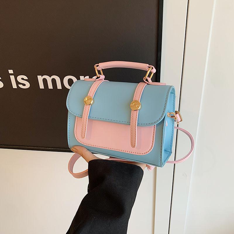 

Chic And Modern Pu Leather Handbag With Unique Stitching Details For Everyday Fashion синій