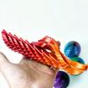 3D Printed Twisting Egg Toy Stress Relief Spiral Egg Toy Articulated Rotating Egg Fidget Spinner Desk Toy Easter Basket Stuffers Party