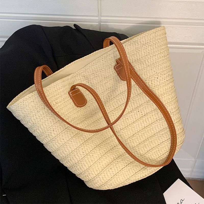 

Woven straw bag women s 2025 new large-capacity versatile commuter shoulder bag fashion beach bag tote bag