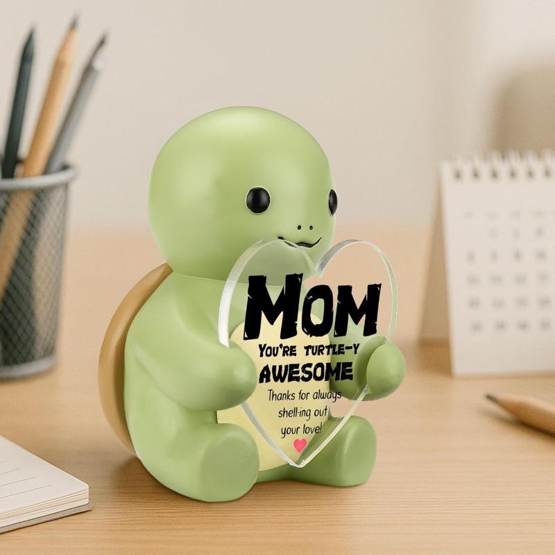 

A Cute Little Turtle Statue Decorates The Gift