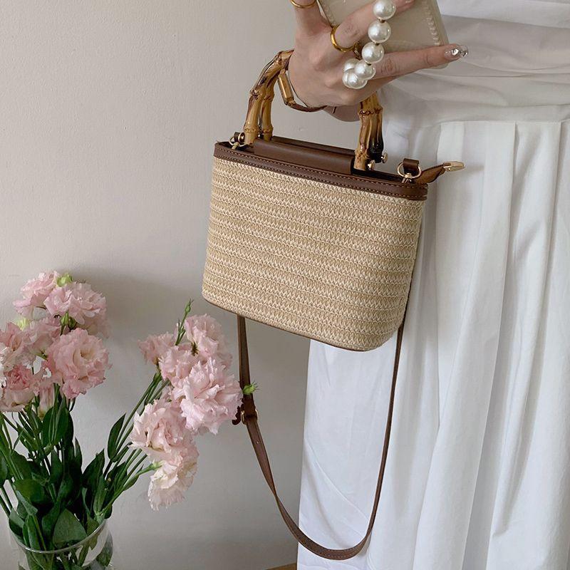 A Niche Crossbody Bag with A Feminine Texture A Hand-held Straw-woven Bucket Bag