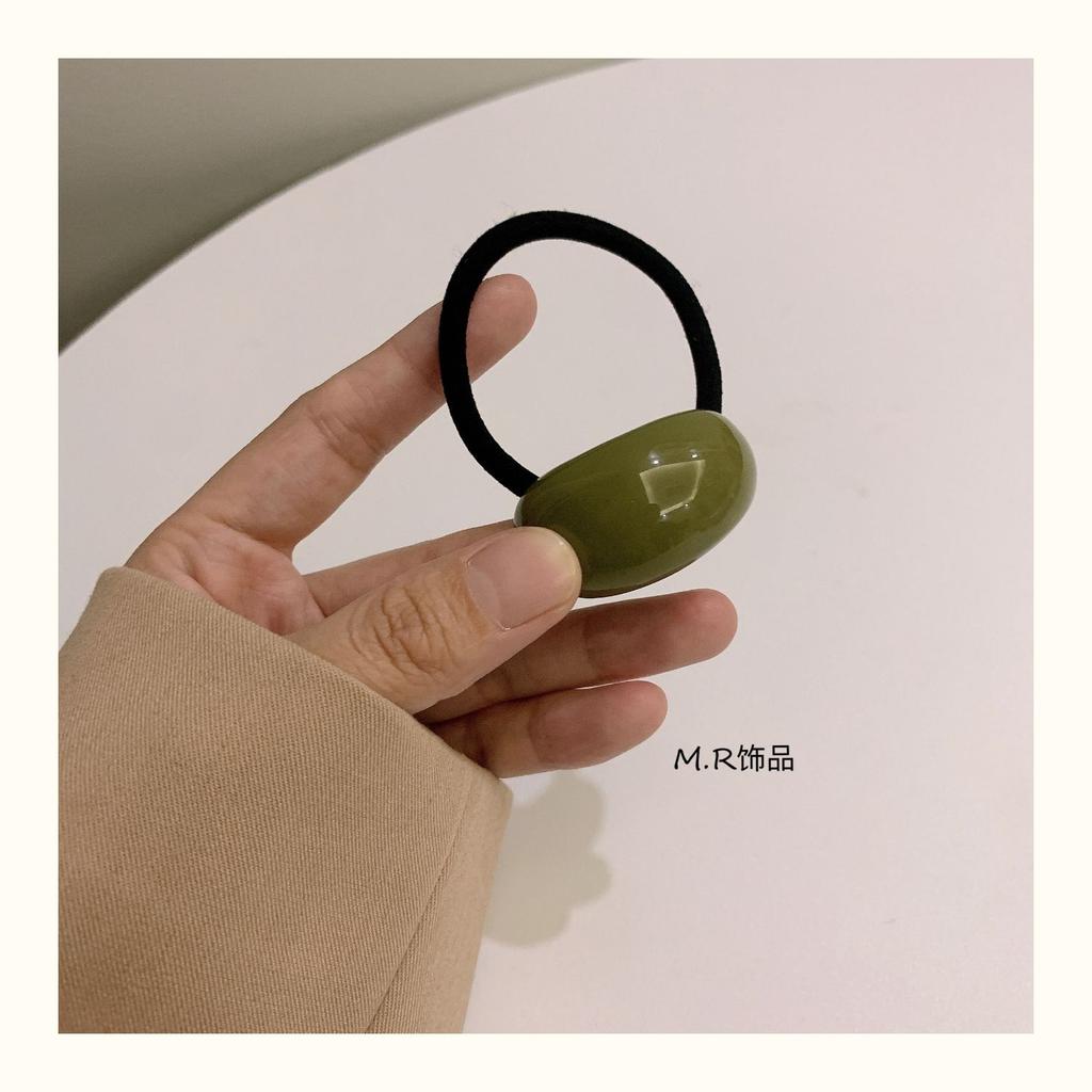 Ein schlichter und eleganter, kalter Stil Acryl-Bogenförmiger Lederband-Kopfschmuck für Damen