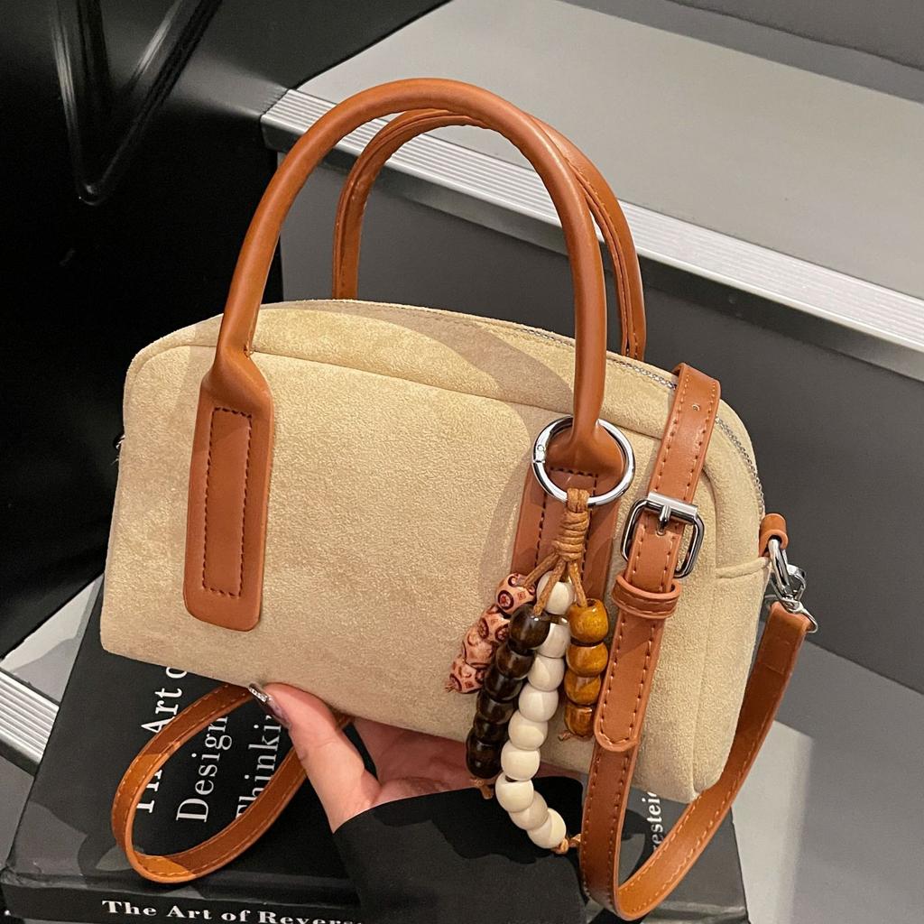 Vintage matte handbag women's 2025 new niche bowling pillow bag commuter shoulder messenger bag