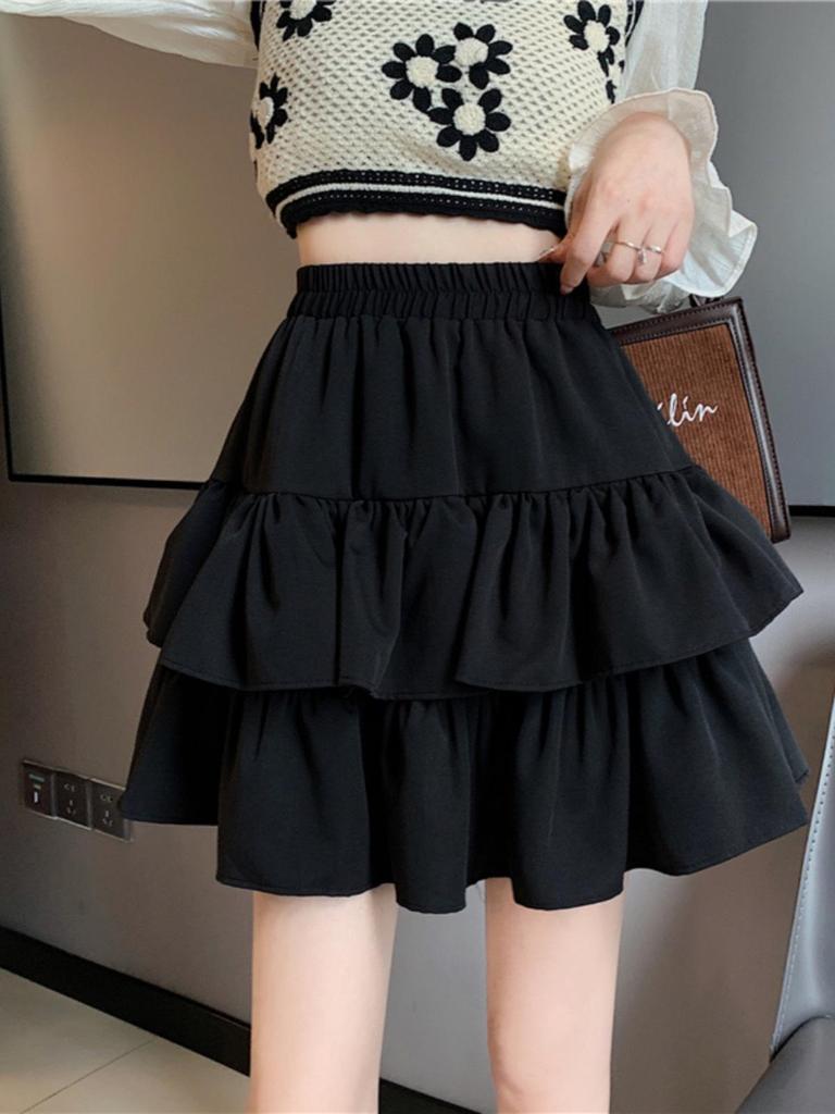 Modischer schwarzer Midi-Rock 2025: Rüschen-Schlankheitsdesign, Hohe Taille, Große Größen, Frühjahrs- und Herbst-Puff-Stil für Damen