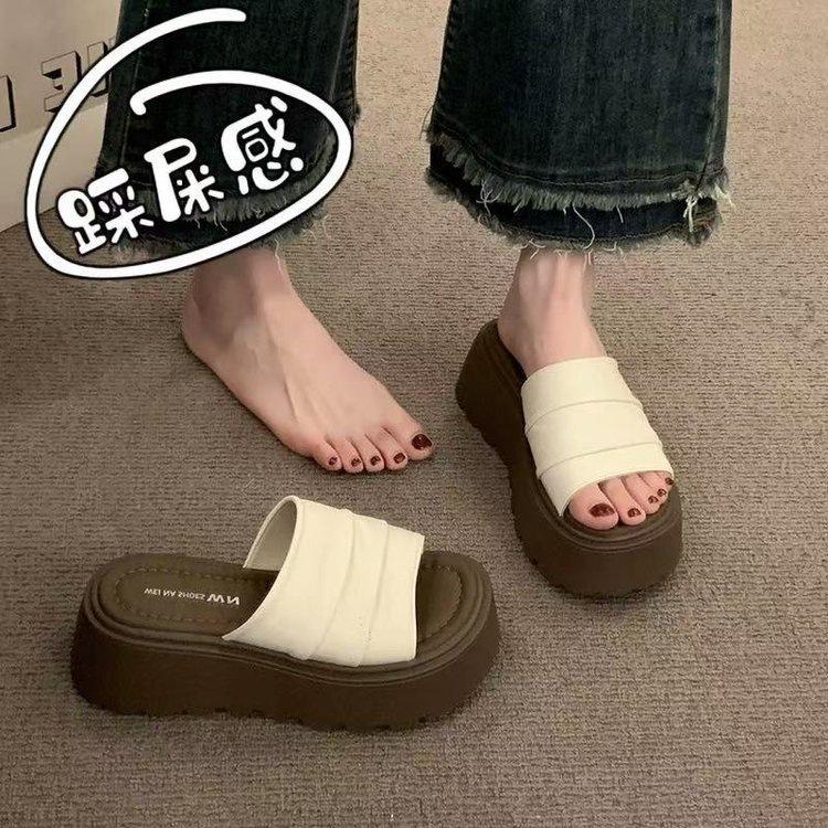 

Thick bottom increases height, wrinkled leather one-word slippers women s summer wear 2025 new models with skirts, beach cool slippers are versatile 40