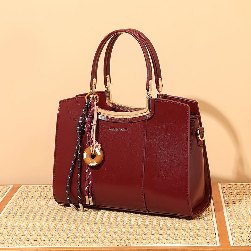 

Elegant 2025 Red Wedding Handbag for Mothers: Spacious, Trendy Chinese Style with Oil Wax Finish Oil Wax Red