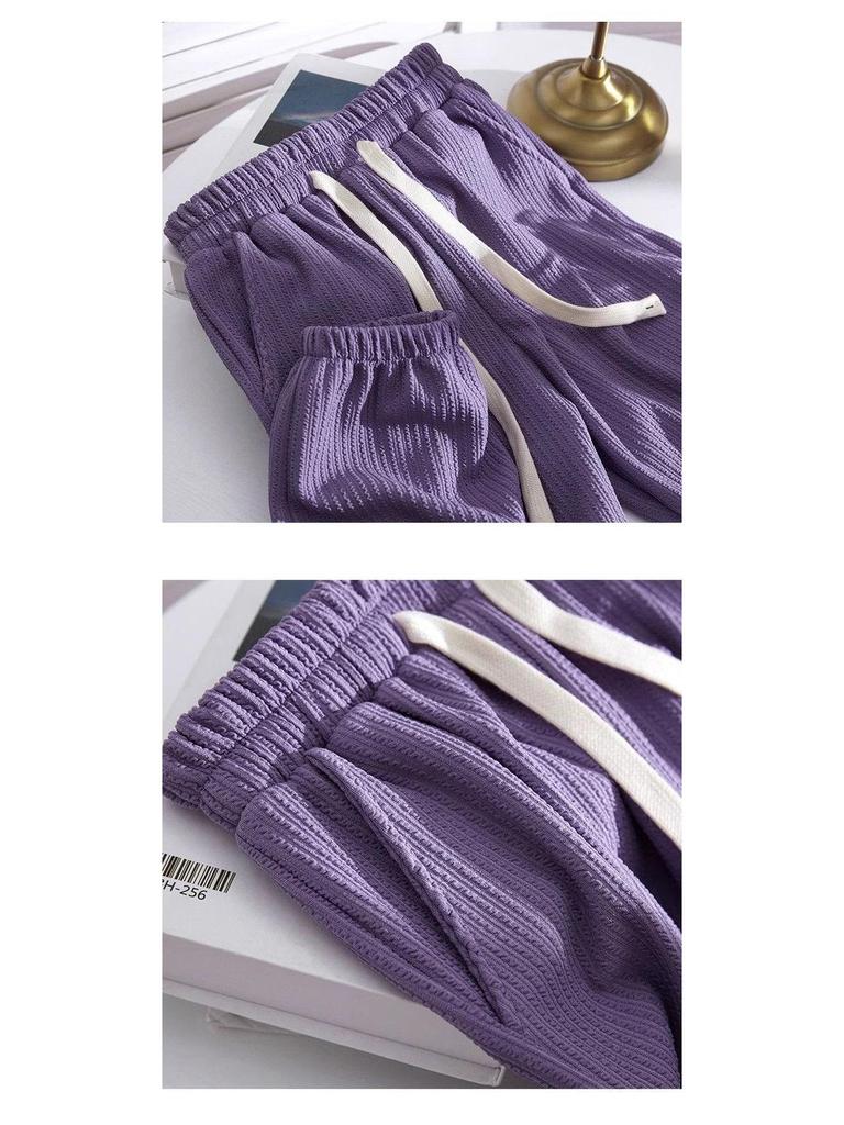 2026 Spring Slimming Joggers: Unisex Polyester Pants for Shorter Frames - Fashionable, Loose-Fit Harem Style for Spring/Autumn.