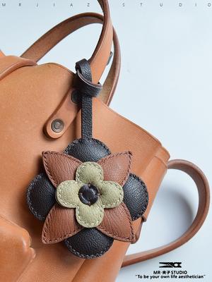 Serie Duohua, colgante de cuero hecho a mano para llave de coche, llavero de alta gama con viento retro de dinero antiguo.
