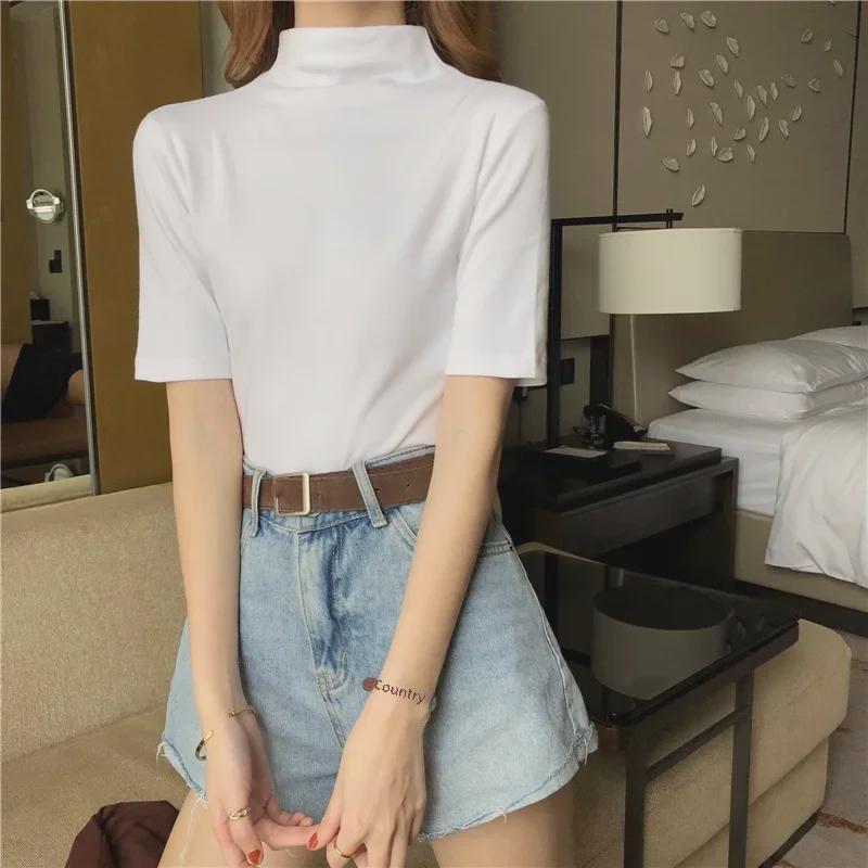 2027 Toma Real: Camiseta de Manga Corta con Cuello Alto Medio Ajustada para Mujer (95 % algodón, 5 % elastano.)